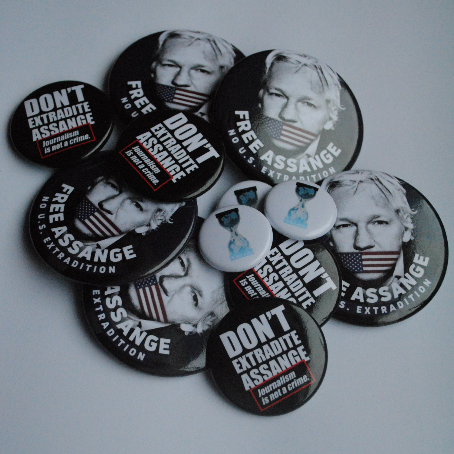 assange-mixed-badgesx12-1_1_.jpg