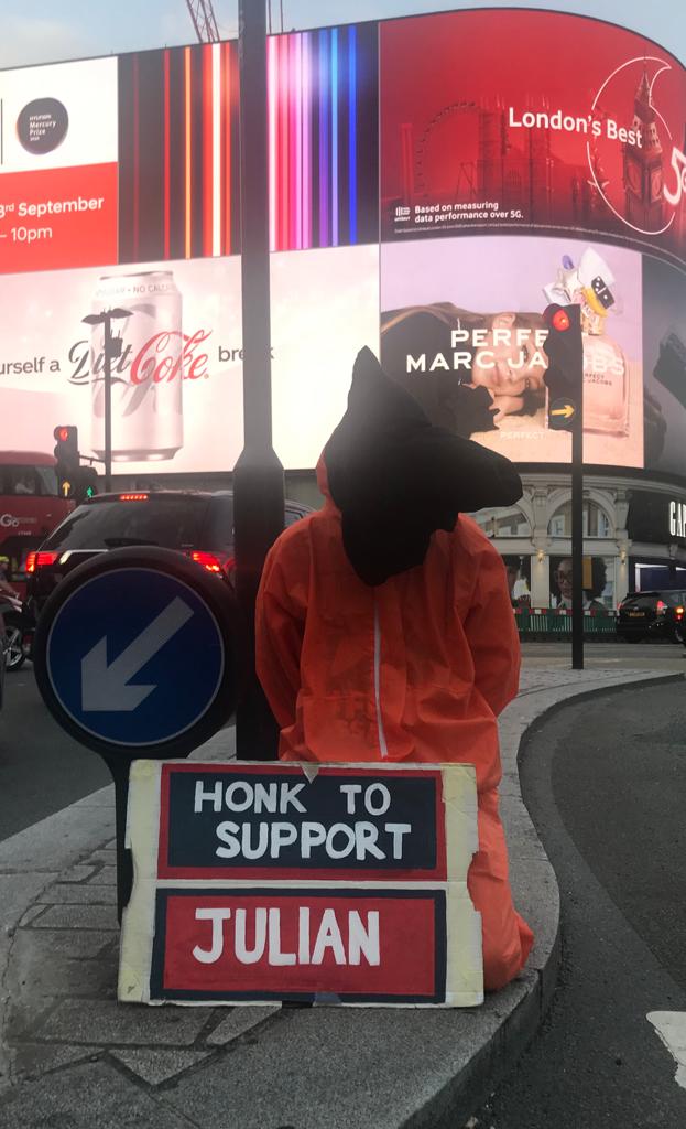 gitmo-suit-picadilly-circus-vigil-19sept20.jpg